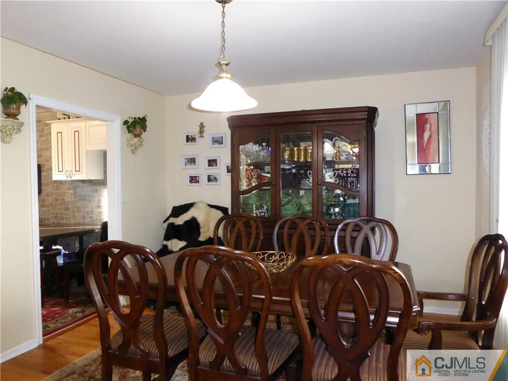 20 Miko Road Edison, NJ 08817 - Photo 6 of 19 a view of a dining room with furniture window and outside view