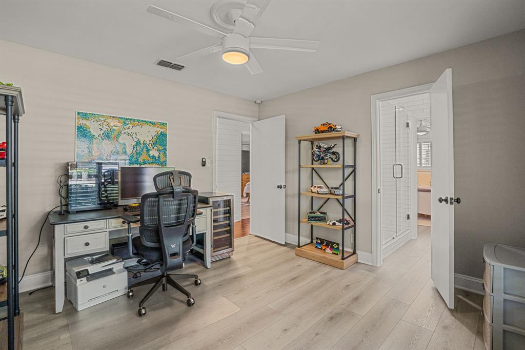 4529 Cloudview Road Fort Worth, TX 76109 - Photo 16 of 26 a view of a workspace with furniture and a window