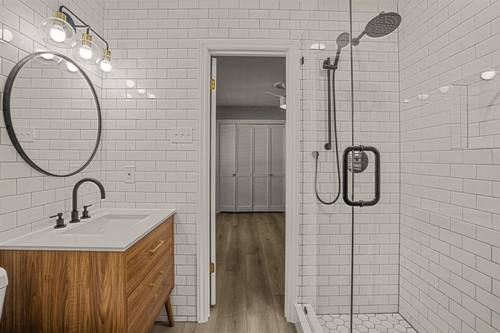 4529 Cloudview Road Fort Worth, TX 76109 - Photo 17 of 26 a bathroom with a sink a toilet and shower