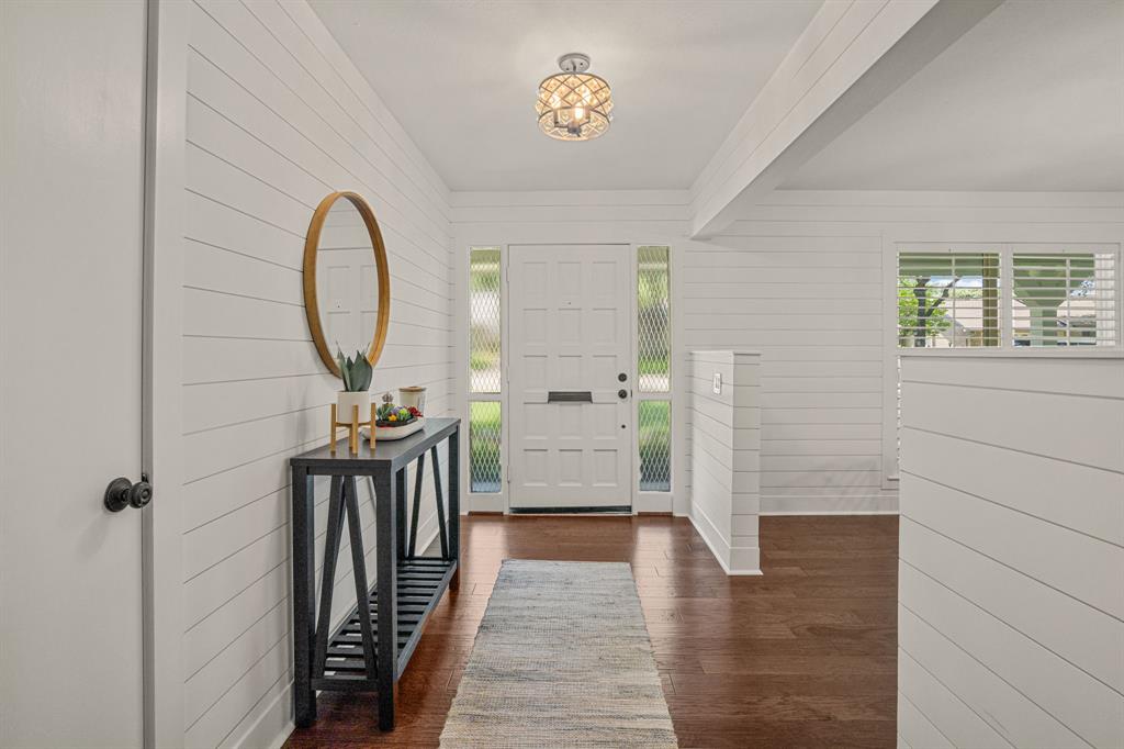 4529 Cloudview Road Fort Worth, TX 76109 - Photo 4 of 26 a view of hallway with wooden floor