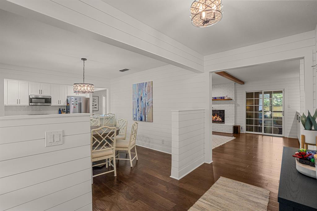 4529 Cloudview Road Fort Worth, TX 76109 - Photo 5 of 26 a kitchen with furniture and a wooden floor