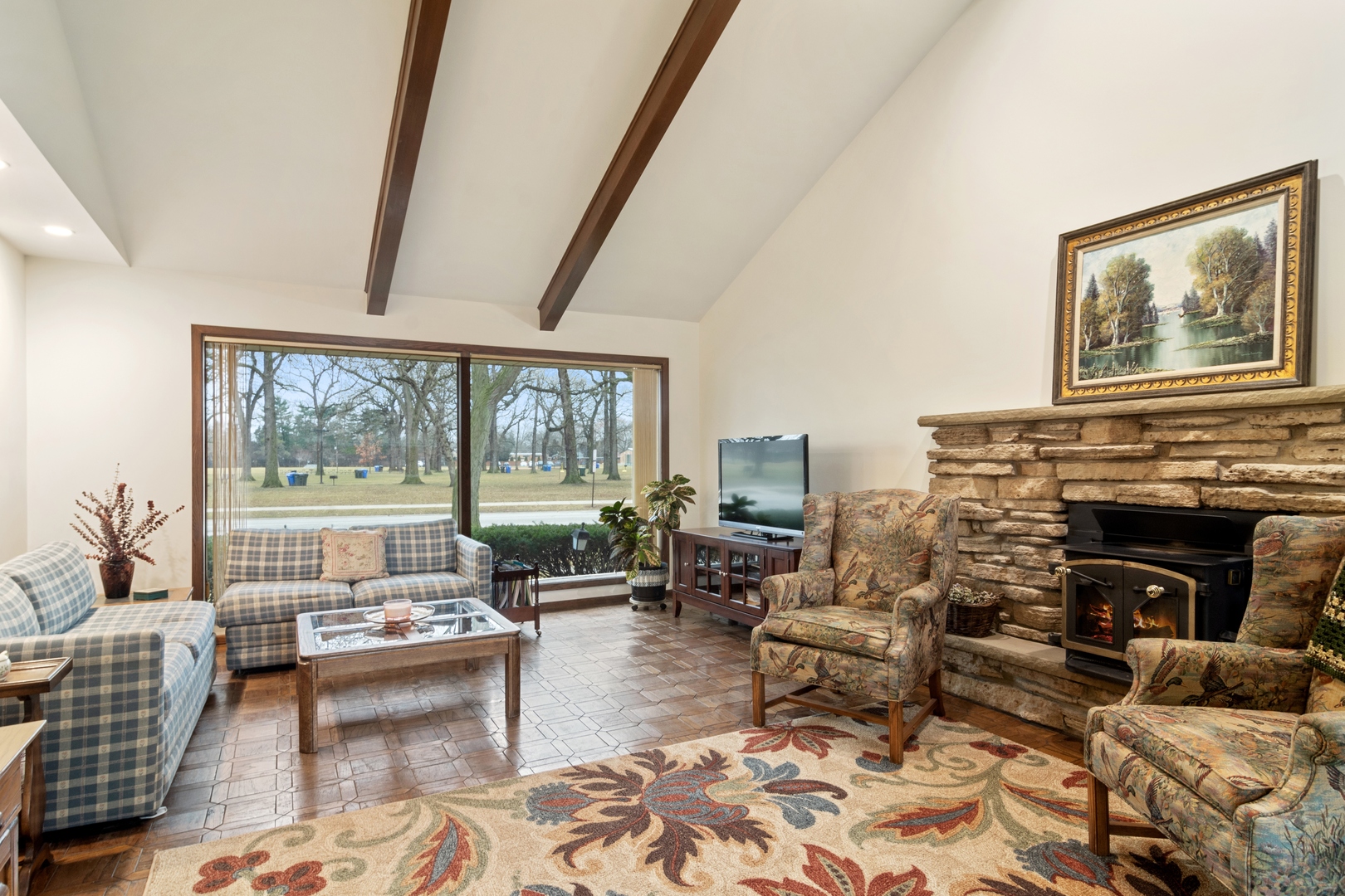 1301 North Dee Road Park Ridge, IL 60068 - Photo 9 of 22 a living room with furniture large window and a fireplace