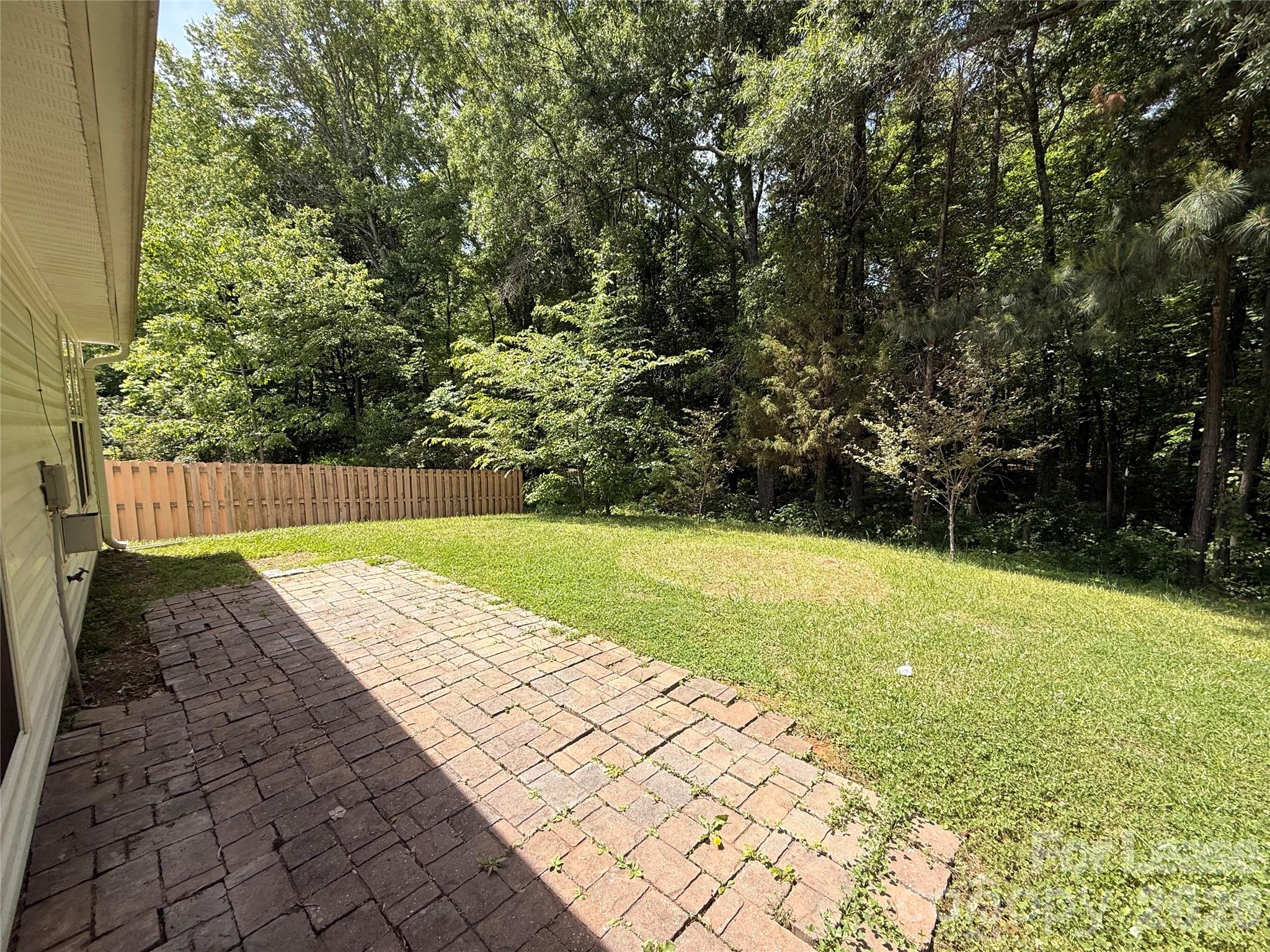 10553 Gold Pan Road Charlotte, NC 28215 - Photo 15 of 15 a view of yard with green space