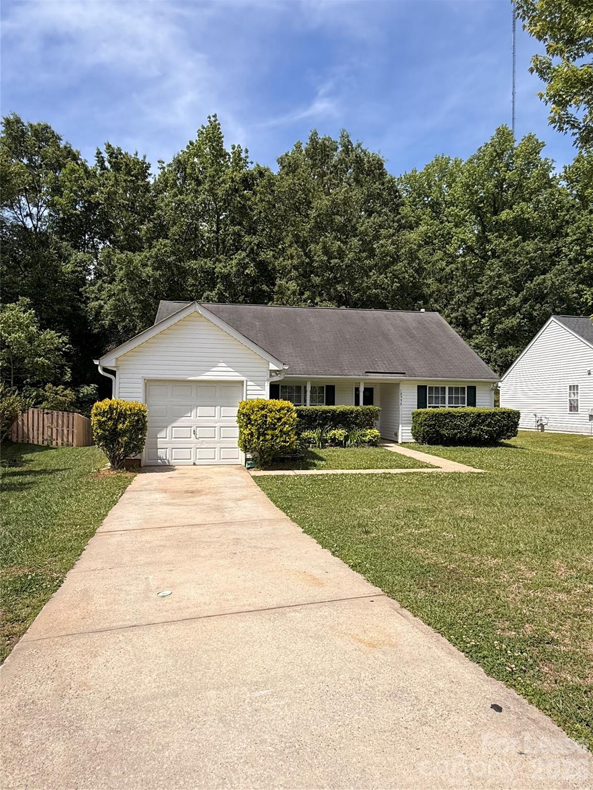 10553 Gold Pan Road Charlotte, NC 28215 - Photo 2 of 15 a front view of a house with a yard