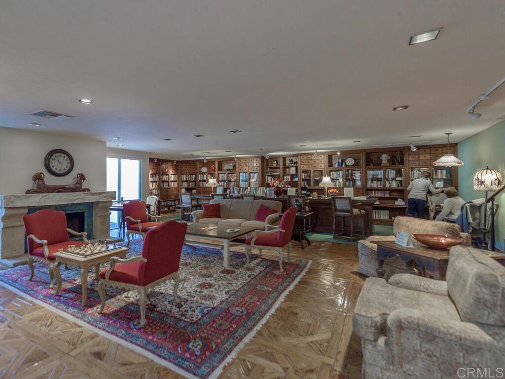 6033 Patmos Way Oceanside, CA 92056 - Photo 33 of 41 a living room with lots of furniture and rug