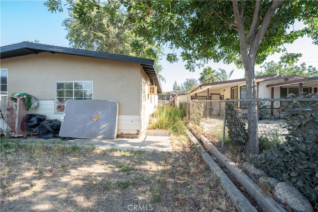 6174 Jurupa Avenue Riverside, CA 92504 - Photo 9 of 30 a view of a house with a yard
