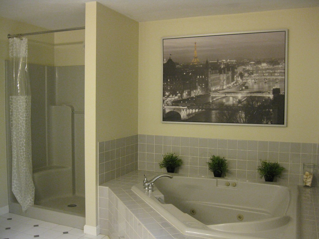 8 Abbey Road Walpole, MA 02071 - Photo 21 of 30 a bathroom with a bathtub and shower