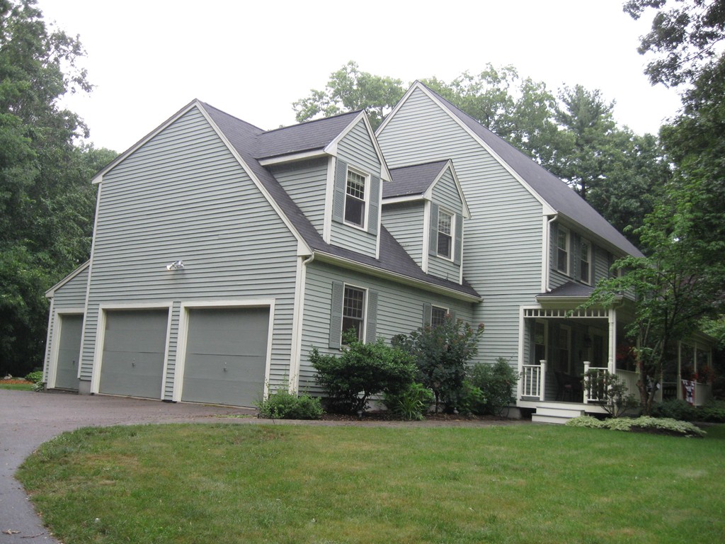 8 Abbey Road Walpole, MA 02071 - Photo 28 of 30 a front view of a house with a yard and porch