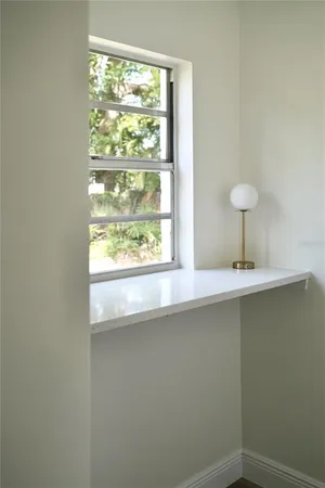 a close up of a sink and a window