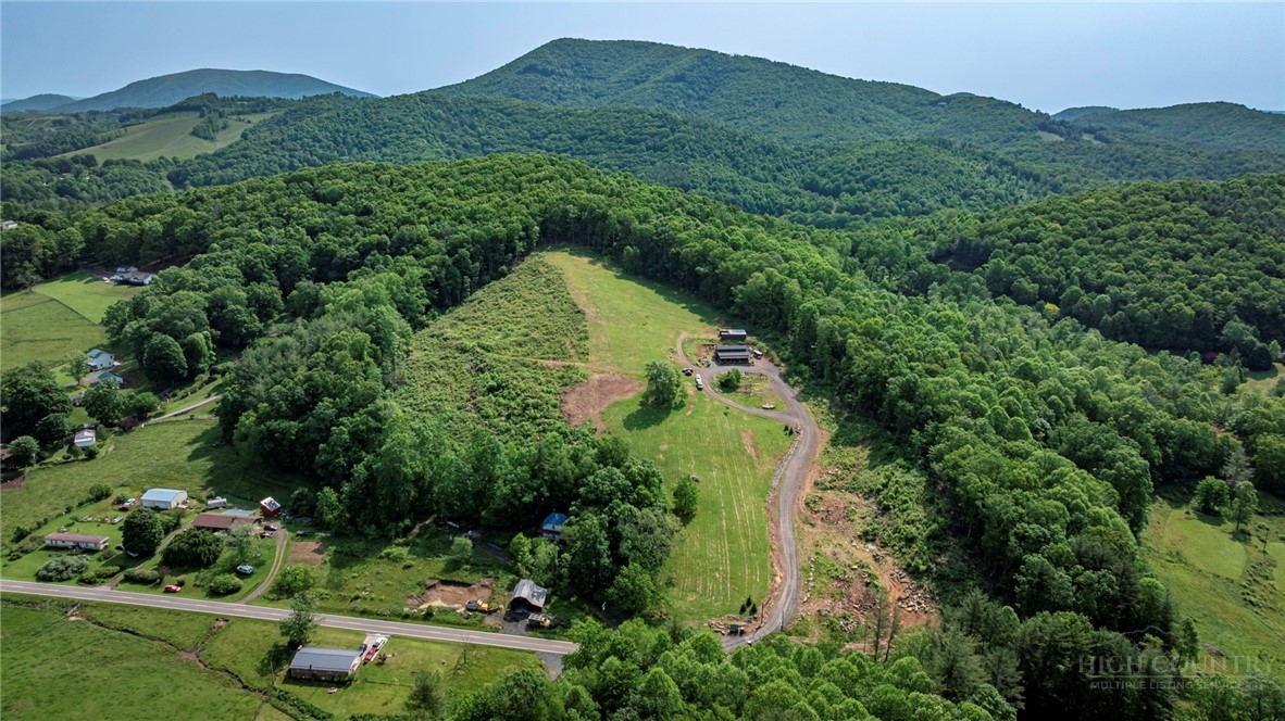 509 Grant Houck Road Todd, NC 28684 - Photo 1 of 43 an aerial view of a house with a yard