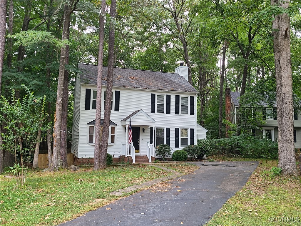 5800 Mill Spring Lane Midlothian, VA 23112 - Photo 1 of 29 front view of a house with a yard