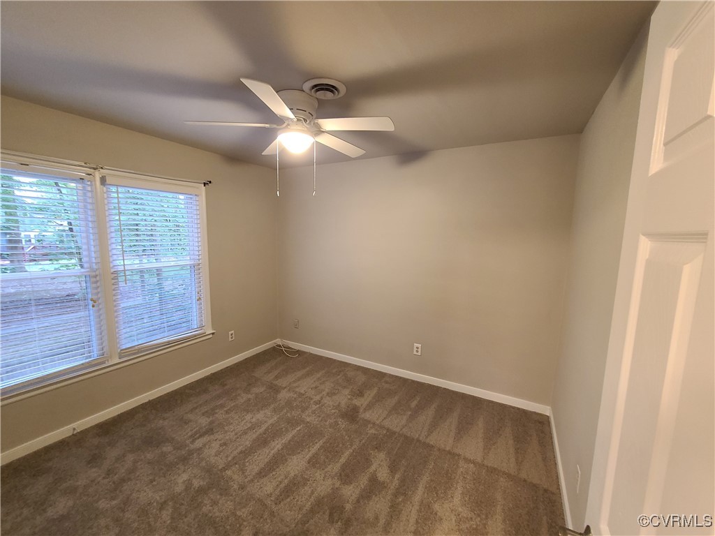 5800 Mill Spring Lane Midlothian, VA 23112 - Photo 12 of 29 an empty room with windows and fan