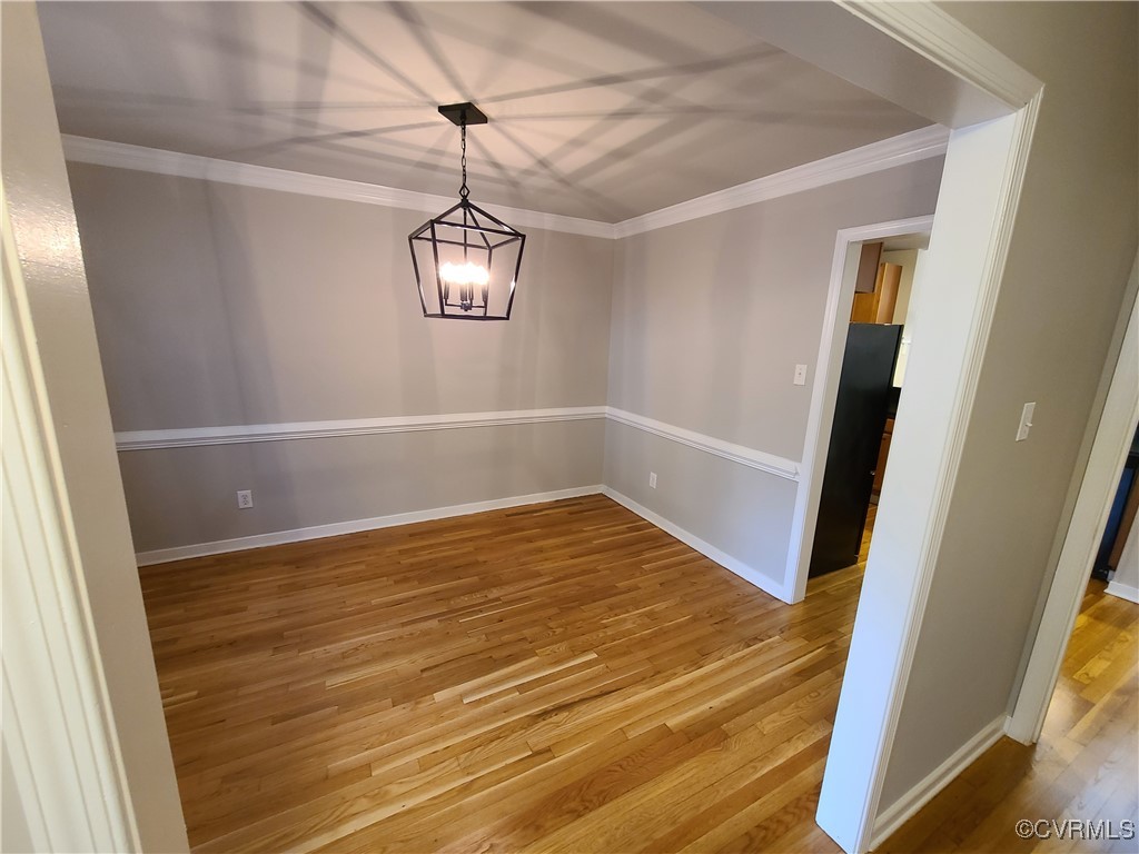 5800 Mill Spring Lane Midlothian, VA 23112 - Photo 5 of 29 a view of empty room with wooden floor and fan