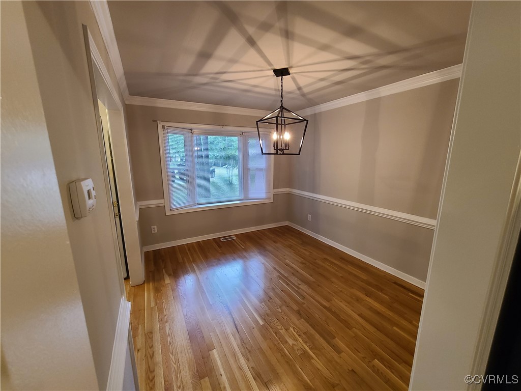 5800 Mill Spring Lane Midlothian, VA 23112 - Photo 6 of 29 a view of empty room with wooden floor and fan