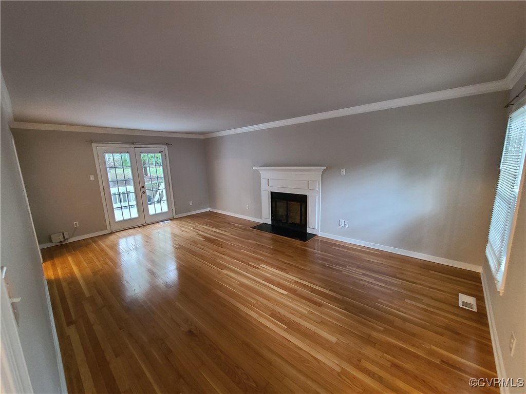 5800 Mill Spring Lane Midlothian, VA 23112 - Photo 8 of 29 wooden floor in an empty room with a window