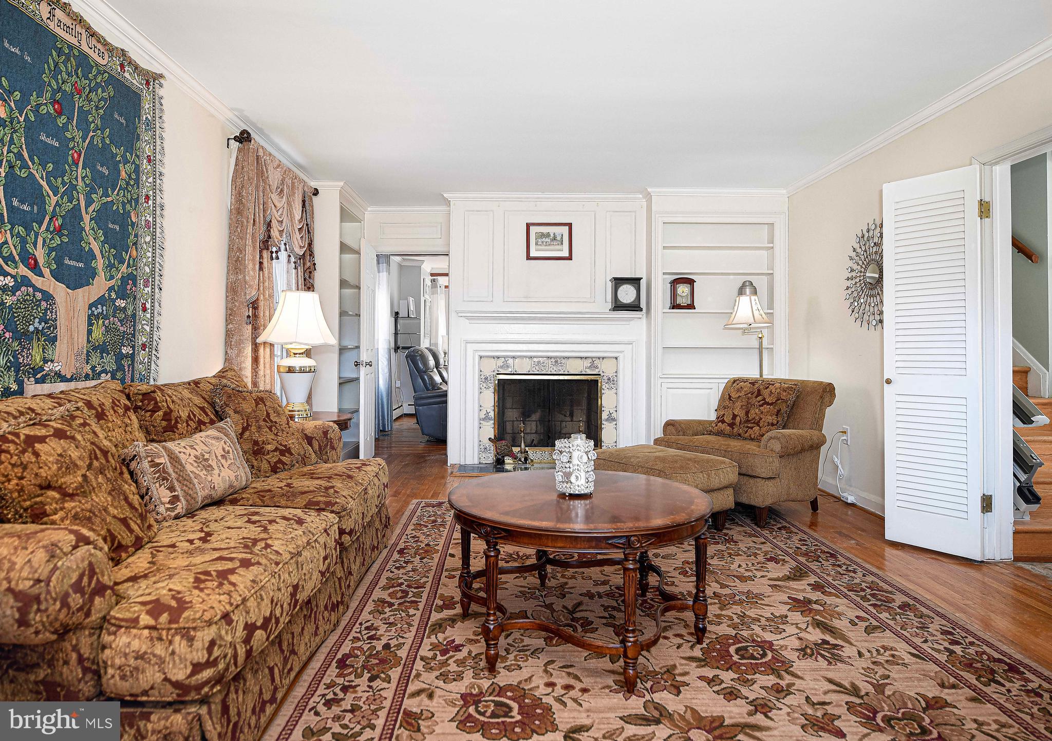 6701 Loch Raven Boulevard Baltimore, MD 21286 - Photo 13 of 44 a living room with furniture and a fireplace