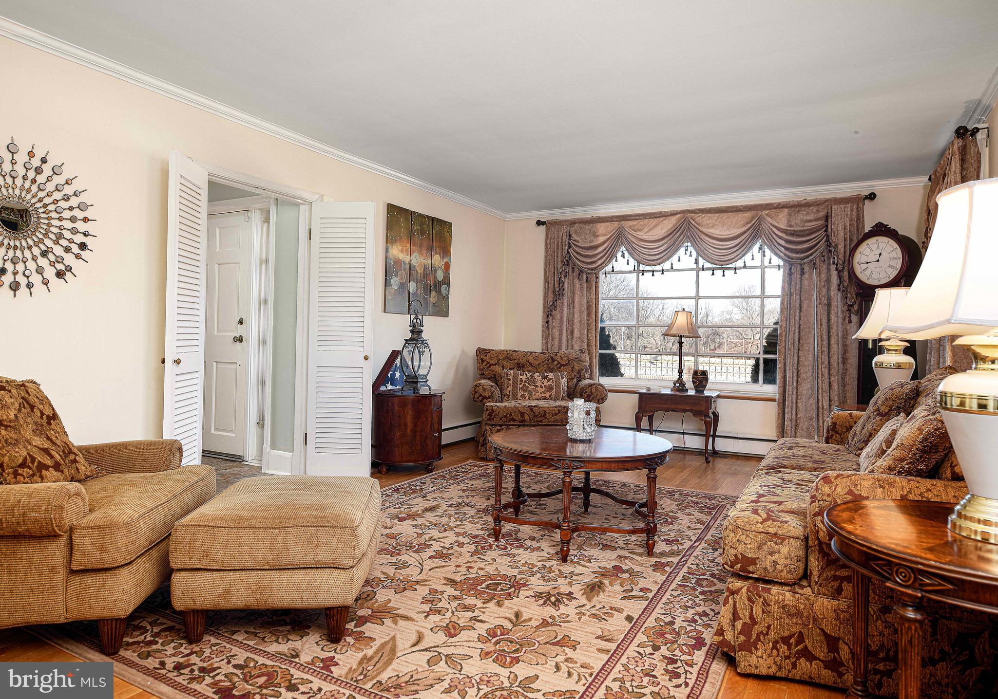 6701 Loch Raven Boulevard Baltimore, MD 21286 - Photo 14 of 44 a living room with furniture and a large window