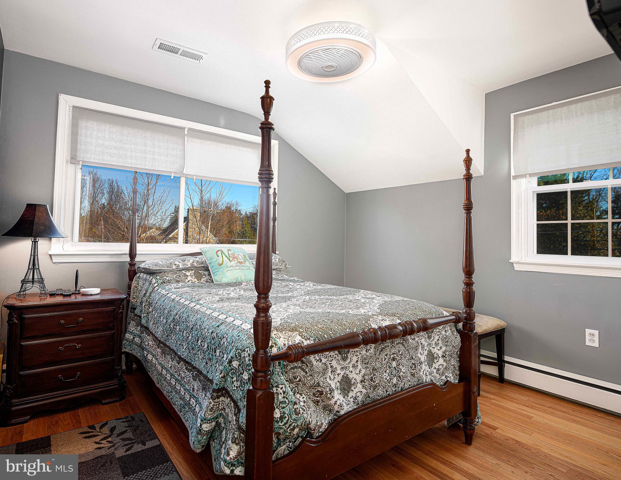 6701 Loch Raven Boulevard Baltimore, MD 21286 - Photo 27 of 44 a bedroom with a bed and large window