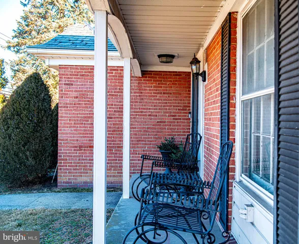a view of balcony with furniture and outdoor seating