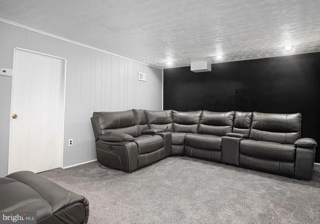 a living room with furniture and a couch