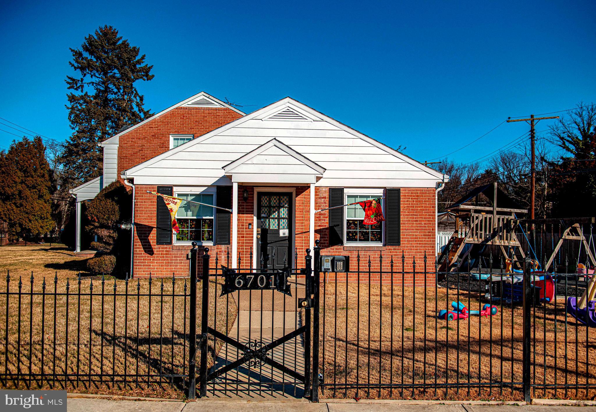 6701 Loch Raven Boulevard Baltimore, MD 21286 - Photo 35 of 44 a view of a house with backyard and sitting area