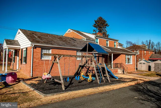 a view of a chairs and table in the patio