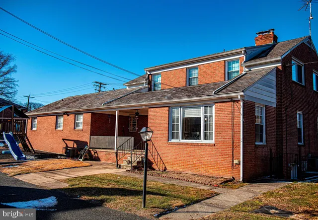 a backyard of a house with seating space