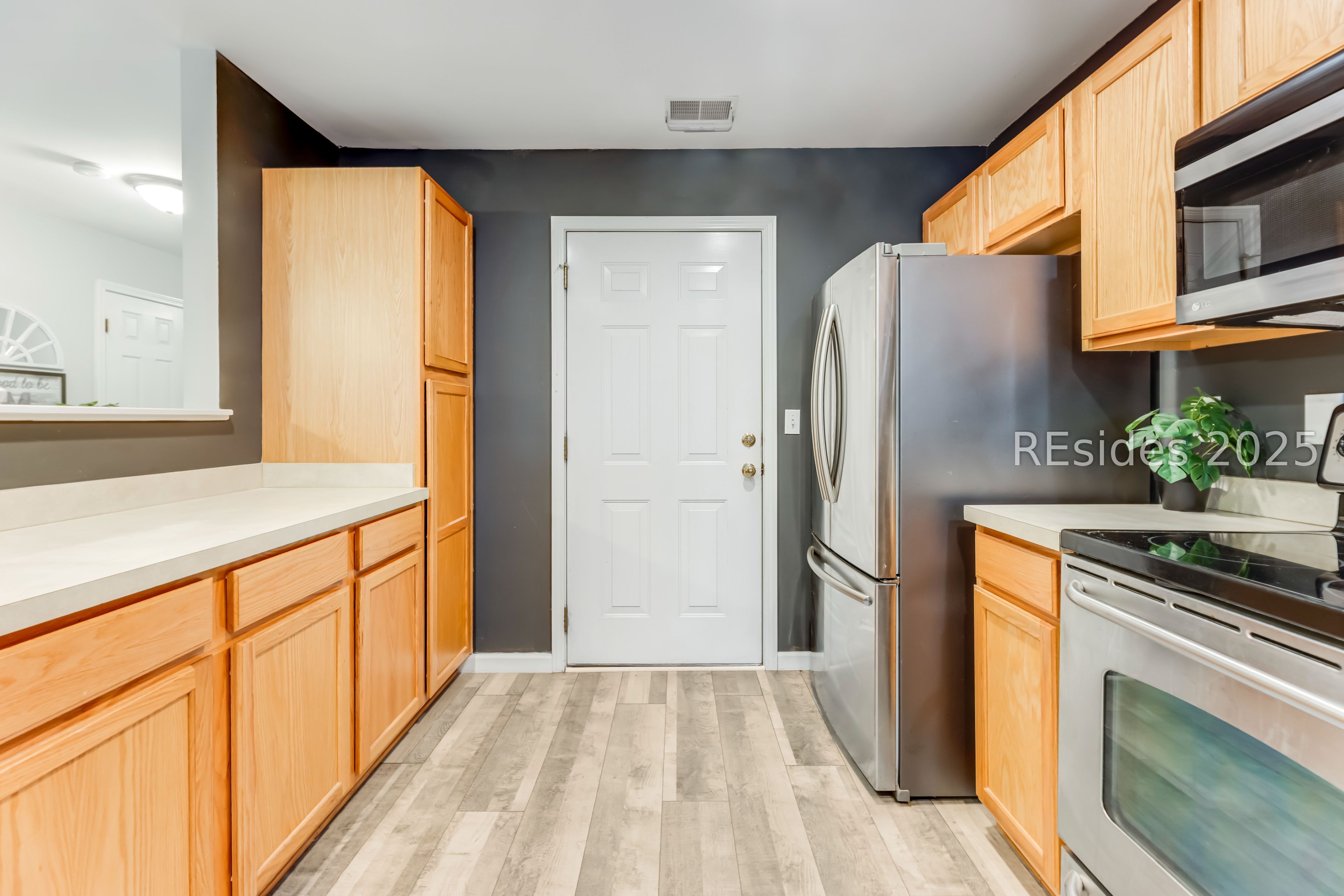 113 Cross Road Bluffton, SC 29910 - Photo 5 of 30 Doorway into attached garage