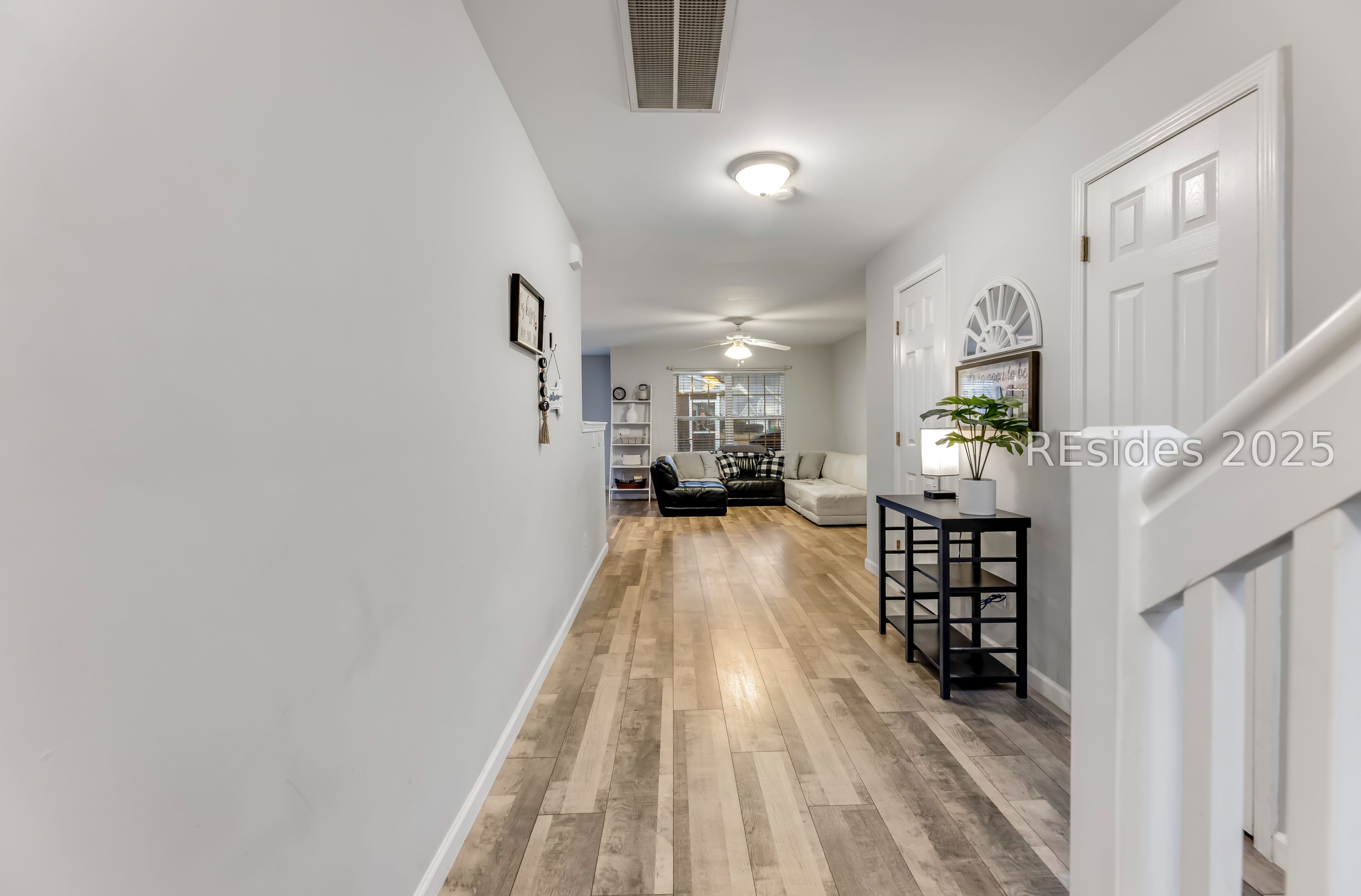 113 Cross Road Bluffton, SC 29910 - Photo 10 of 30 Entryway and door to first-floor half bath