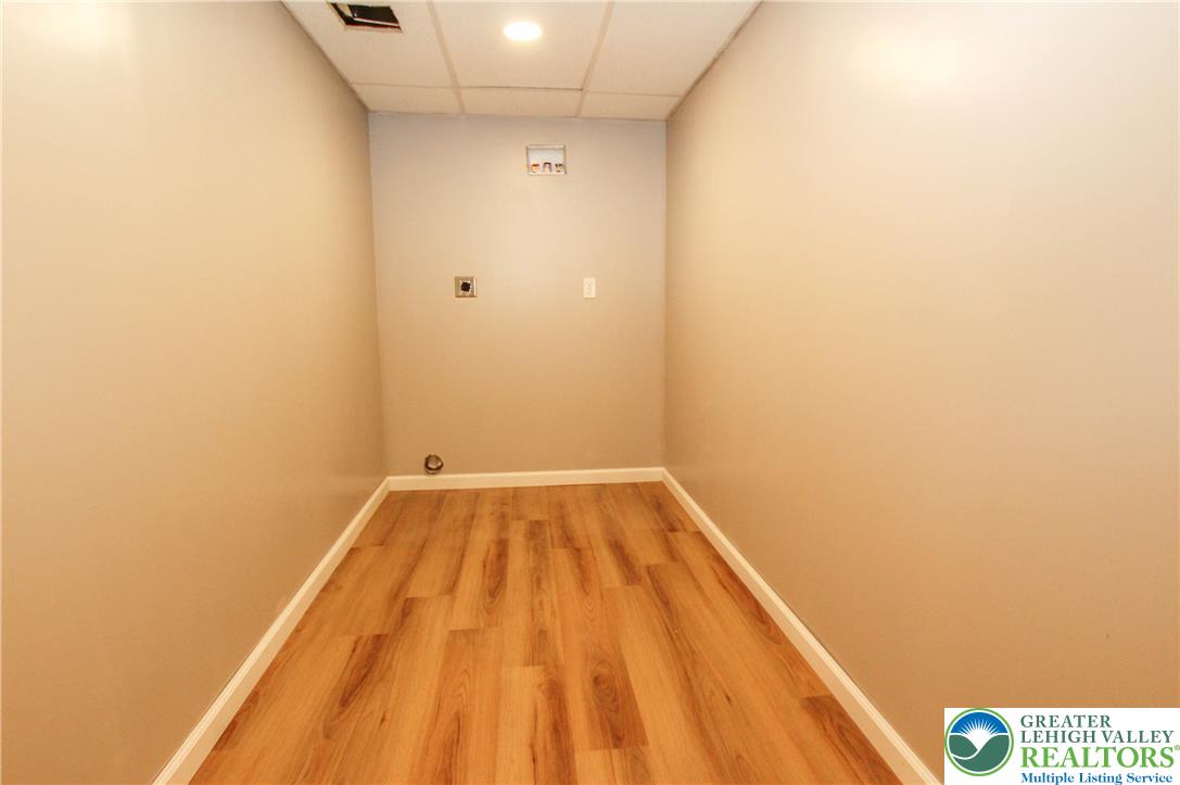 492 Filetown Road Nazareth, PA 18064 - Photo 26 of 30 A dedicated laundry space with warm wood flooring, ready for your appliances.