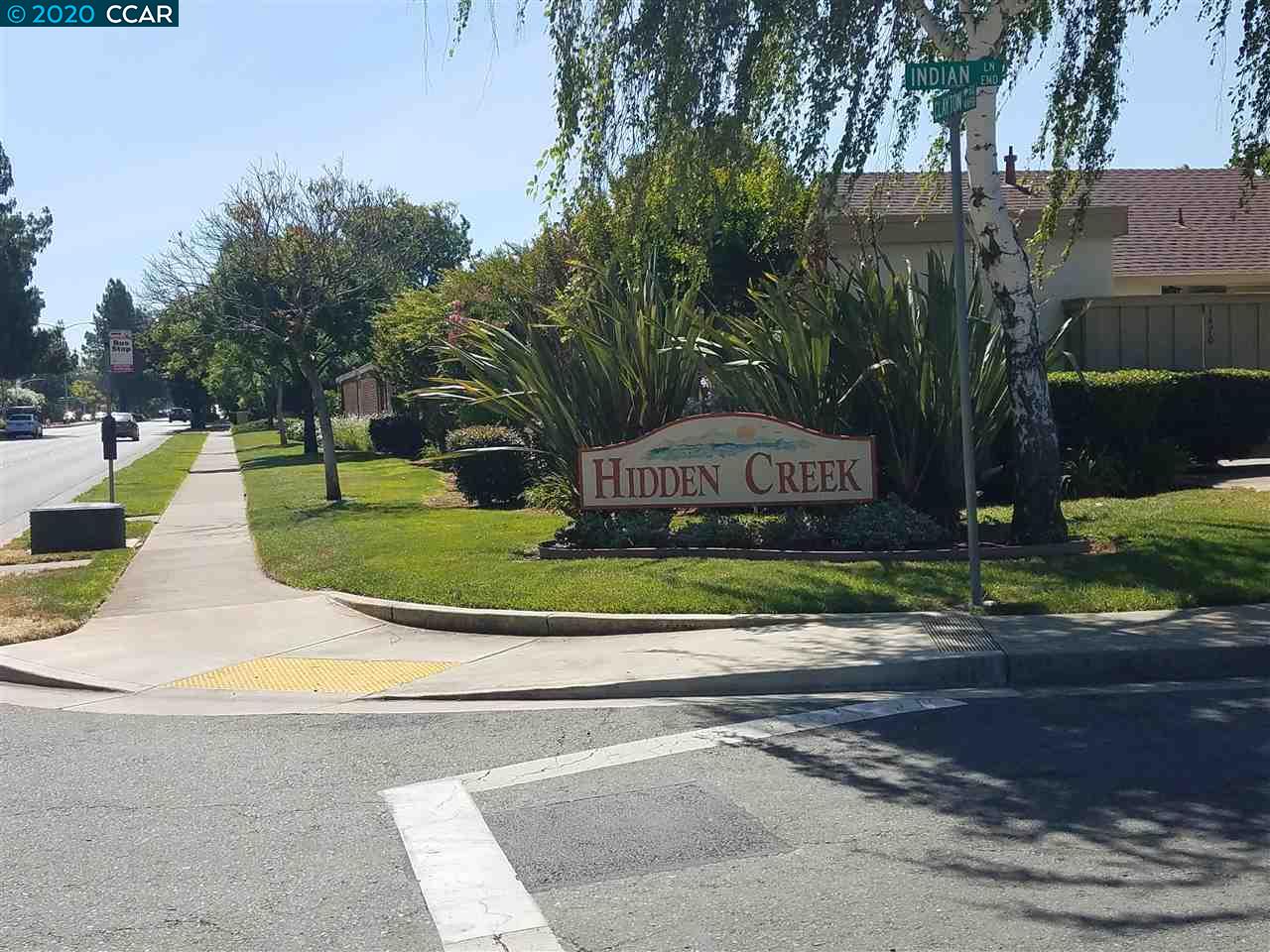 a view of a park with welcome board
