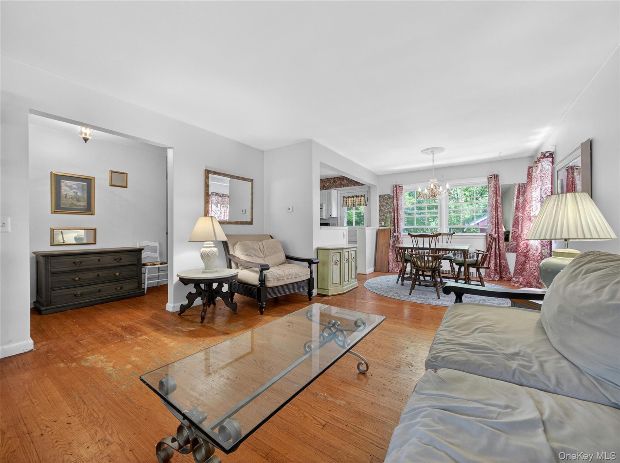 56 Oak Road New City, NY 10956 - Photo 5 of 30 a living room with furniture and a dining table