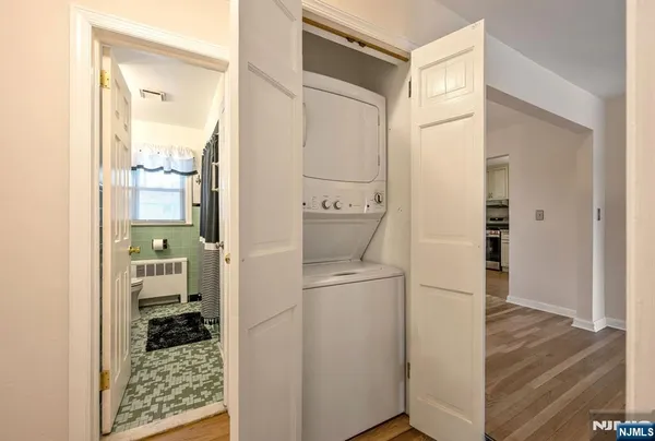 a bathroom with a sink and glass door