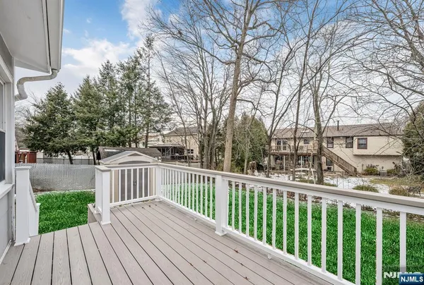 a view of a wooden roof deck