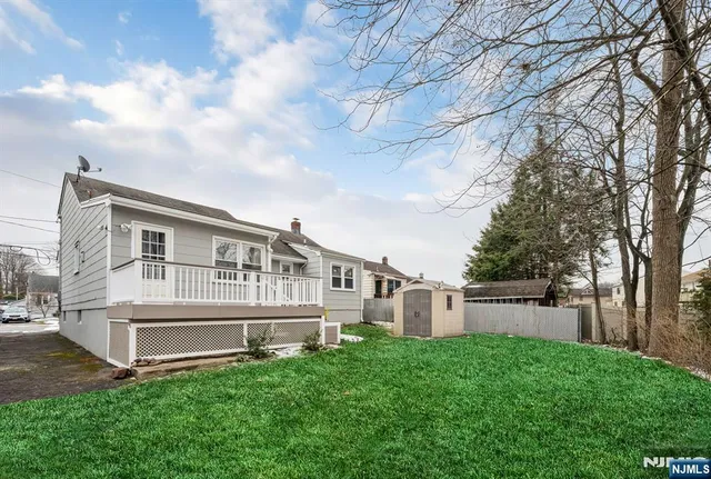 a house view with a garden space