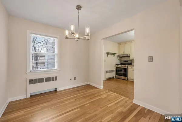 a view of livingroom with hardwood floor and a ceiling fan