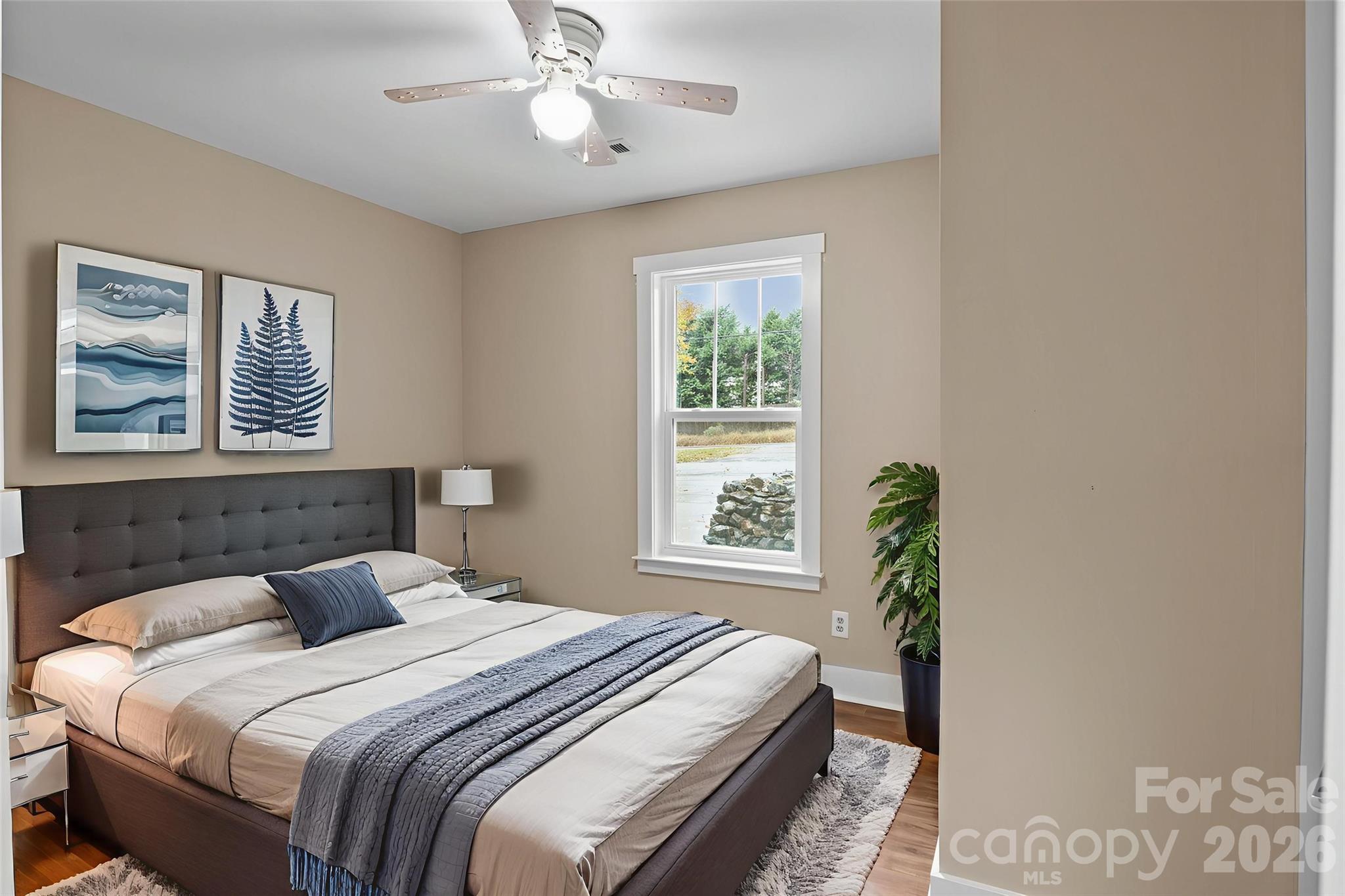 996 Cornelius Road Mooresville, NC 28117 - Photo 20 of 26 a bedroom with a bed and a window