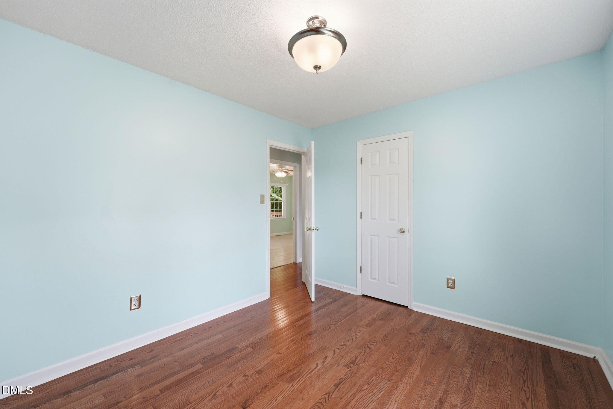 812 East Stagecoach Road Mebane, NC 27302 - Photo 14 of 25 a view of room with wooden floor
