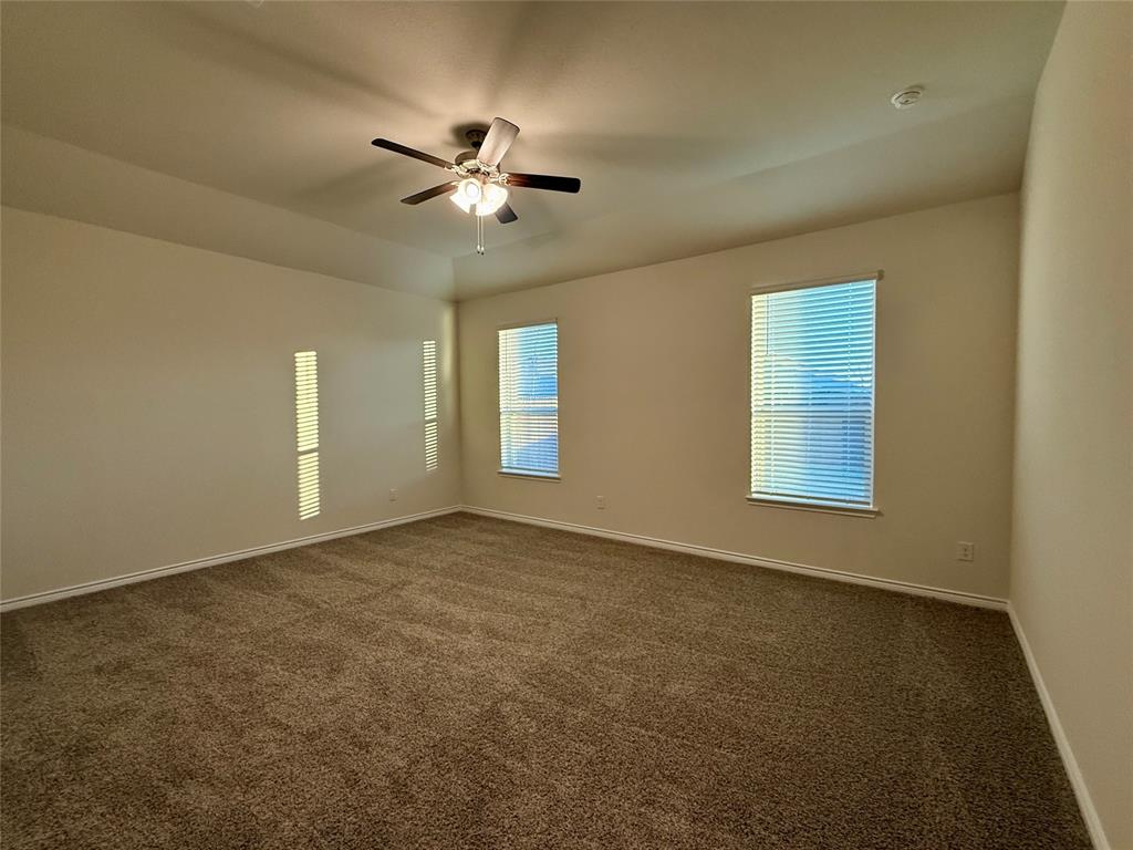 2025 Eugene Street Anna, TX 75409 - Photo 11 of 32 a view of an empty room with a window