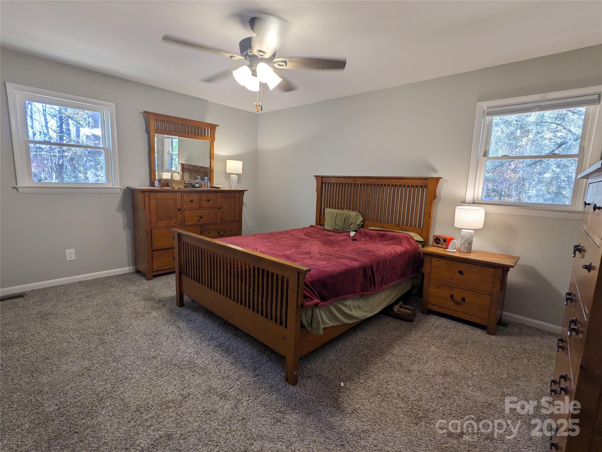 1737 Whiteside Road Forest City, NC 28043 - Photo 8 of 18 a bedroom with a bed dresser and window