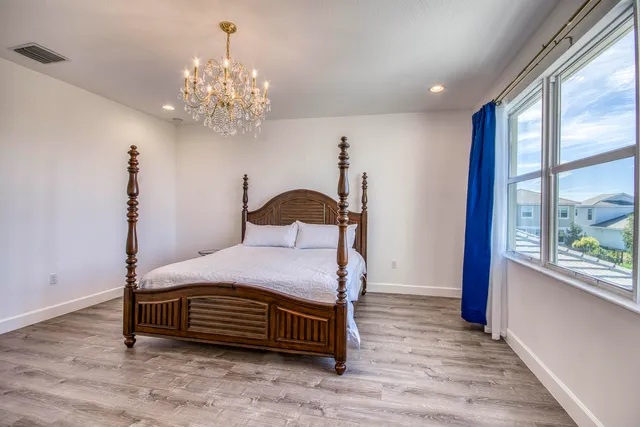 a view of storage and utility room with washer and dryer