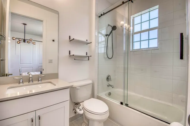 a view of house with swimming pool and porch with furniture