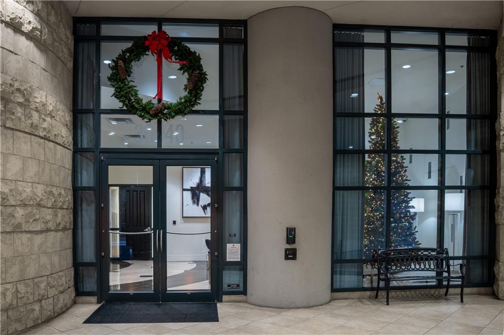 3040 Peachtree Road Northwest, Unit 1602 Atlanta, GA 30305 - Photo 12 of 12 a living room with furniture
