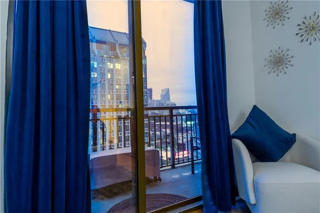 a living room with furniture and a window