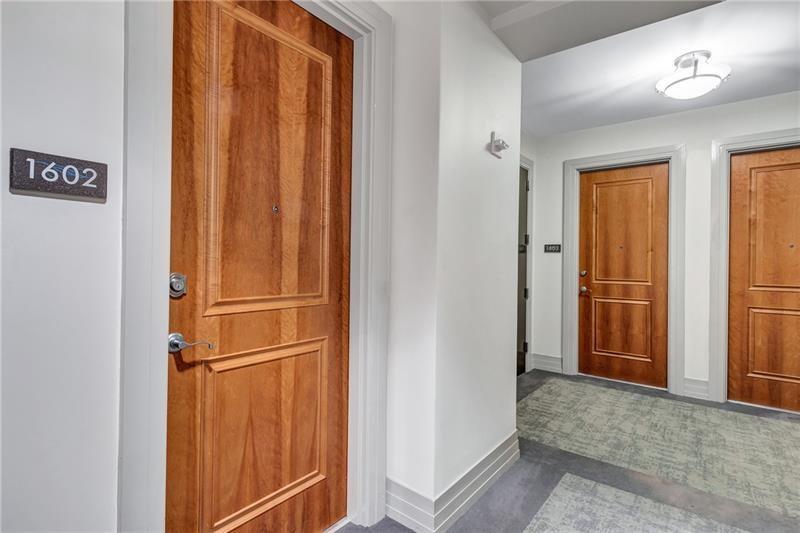 3040 Peachtree Road Northwest, Unit 1602 Atlanta, GA 30305 - Photo 7 of 12 a view of a closet area with an entryway