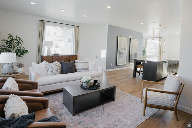 2012 West 1150 South, Unit 1018 Payson, UT 84651 - Photo 6 of 25 Living room with light wood-type flooring and recessed lighting