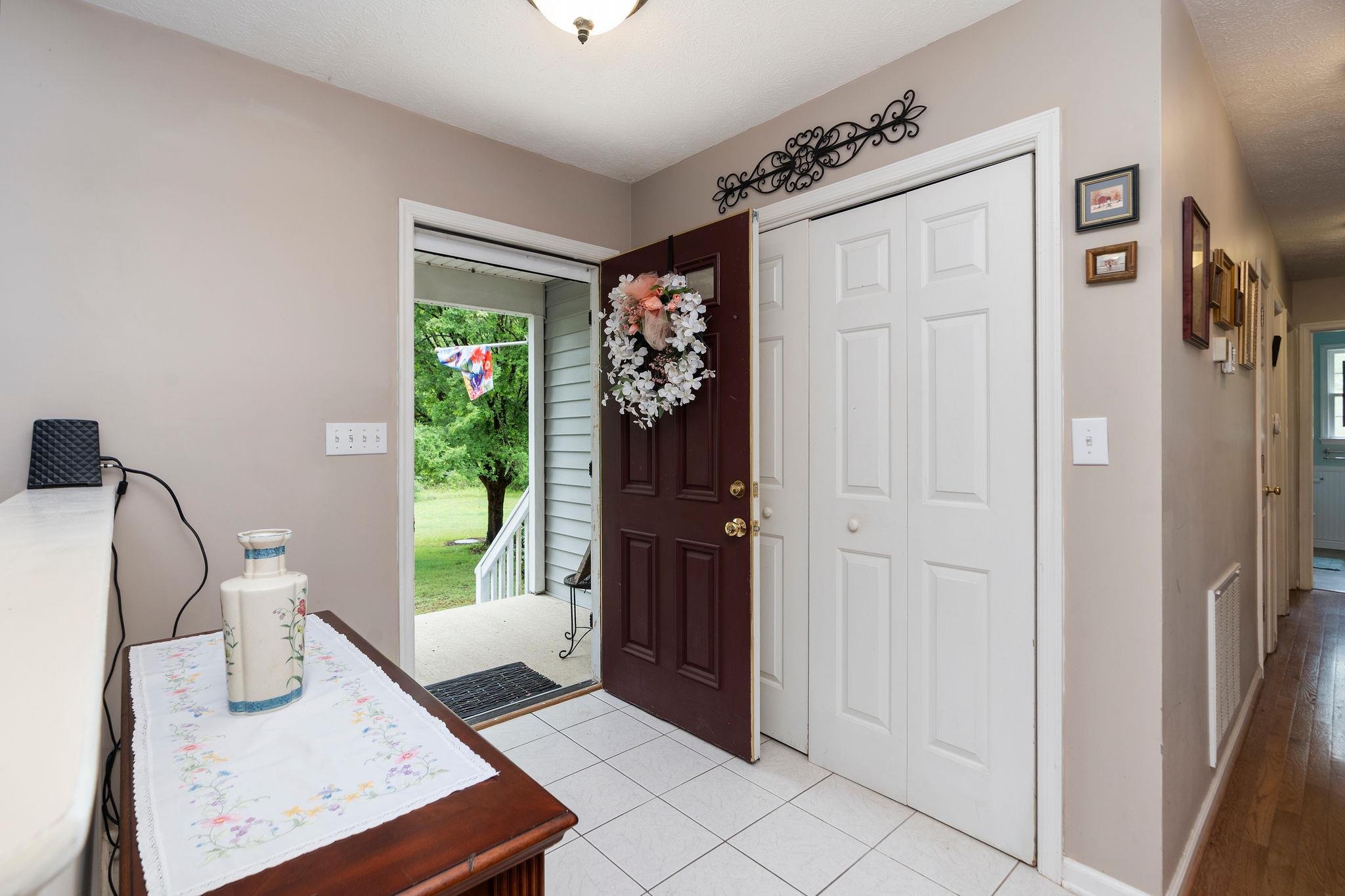 516 Estaline Valley Road Craigsville, VA 24430 - Photo 28 of 75 a view of an entryway with furniture and floor to ceiling window