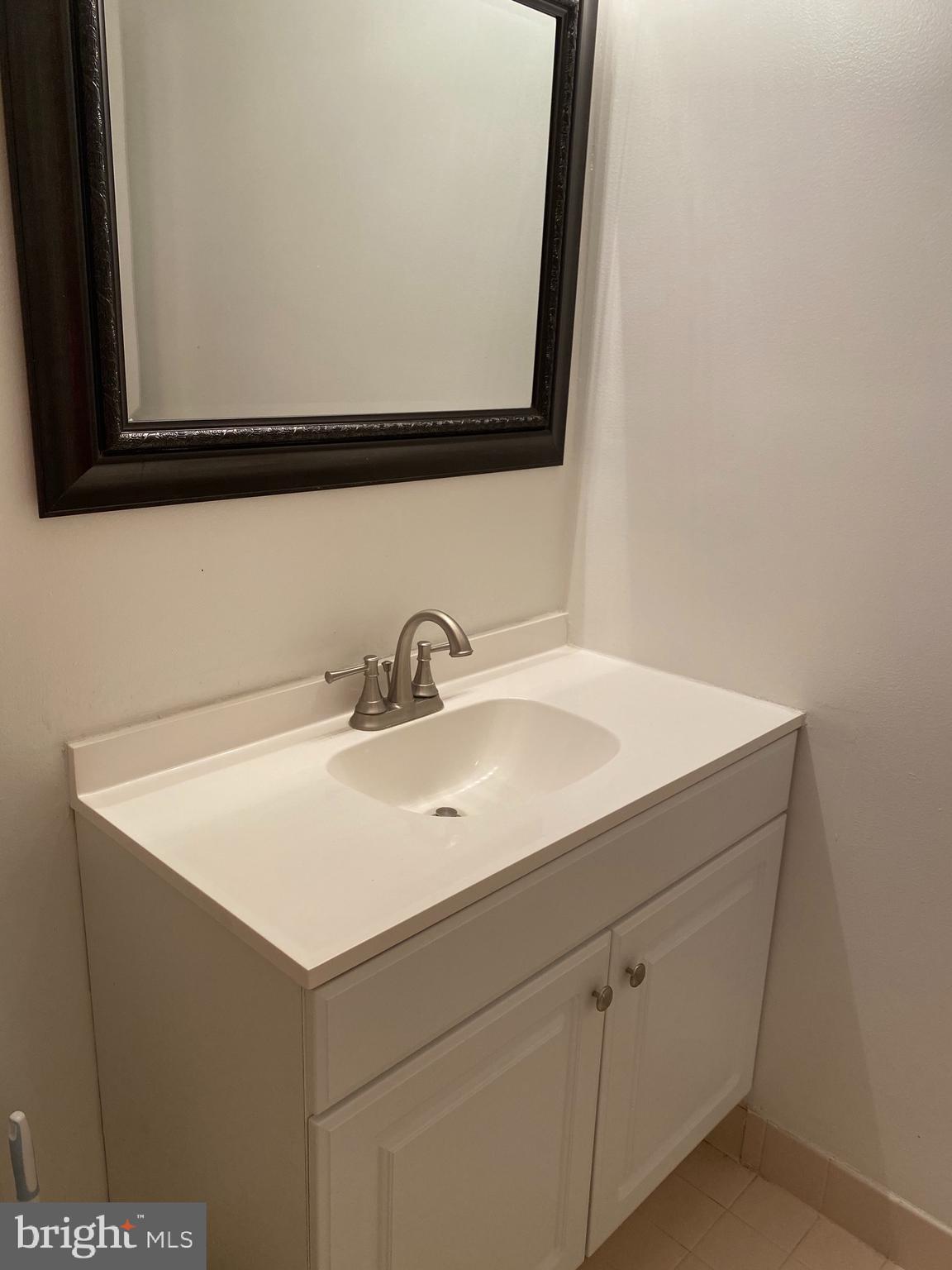 1637 Oakwood Drive, Unit S103 Narberth, PA 19072 - Photo 16 of 23 a close view of sink and tap