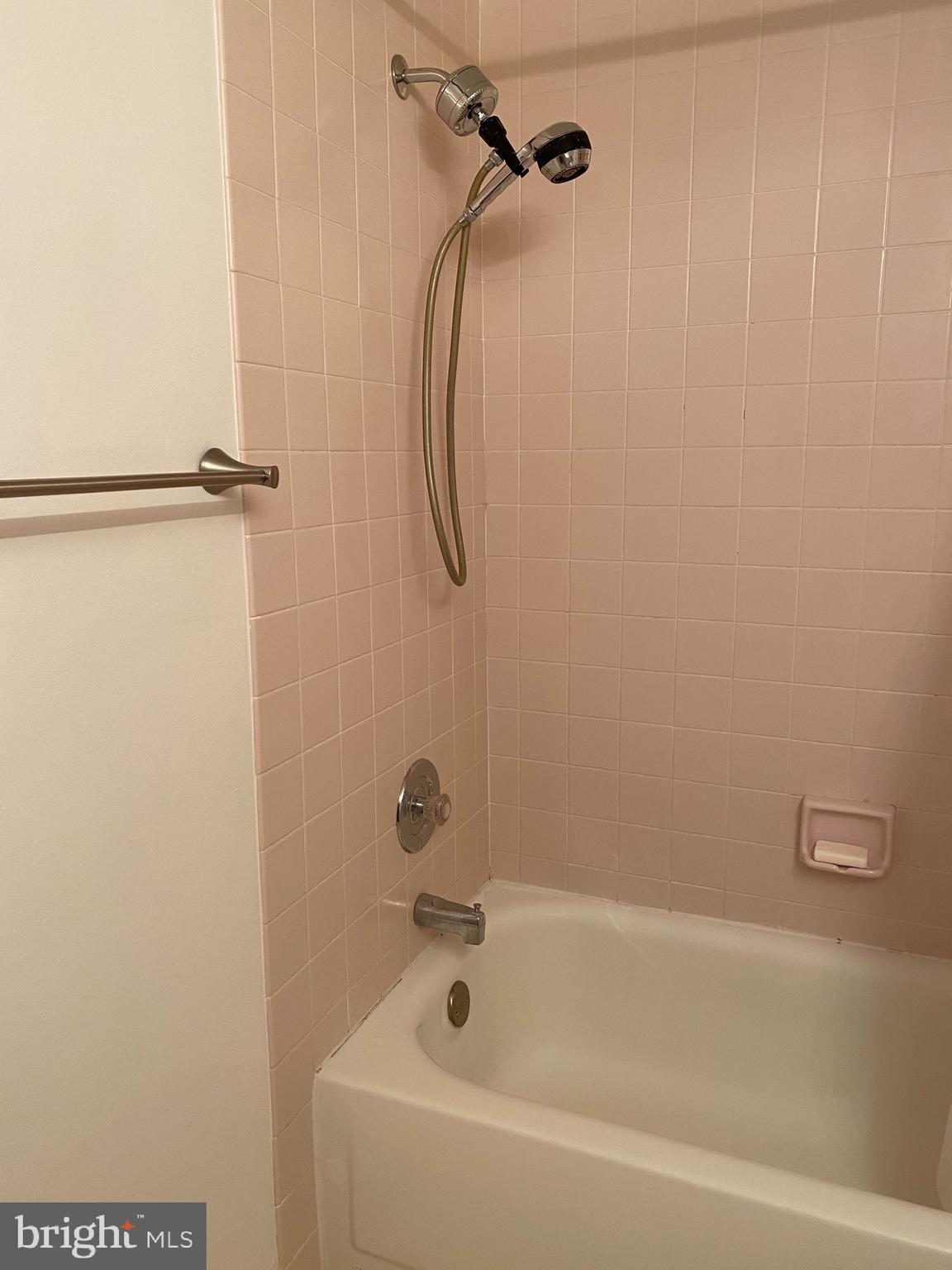 1637 Oakwood Drive, Unit S103 Narberth, PA 19072 - Photo 18 of 23 a bathroom with a shower and a bathtub