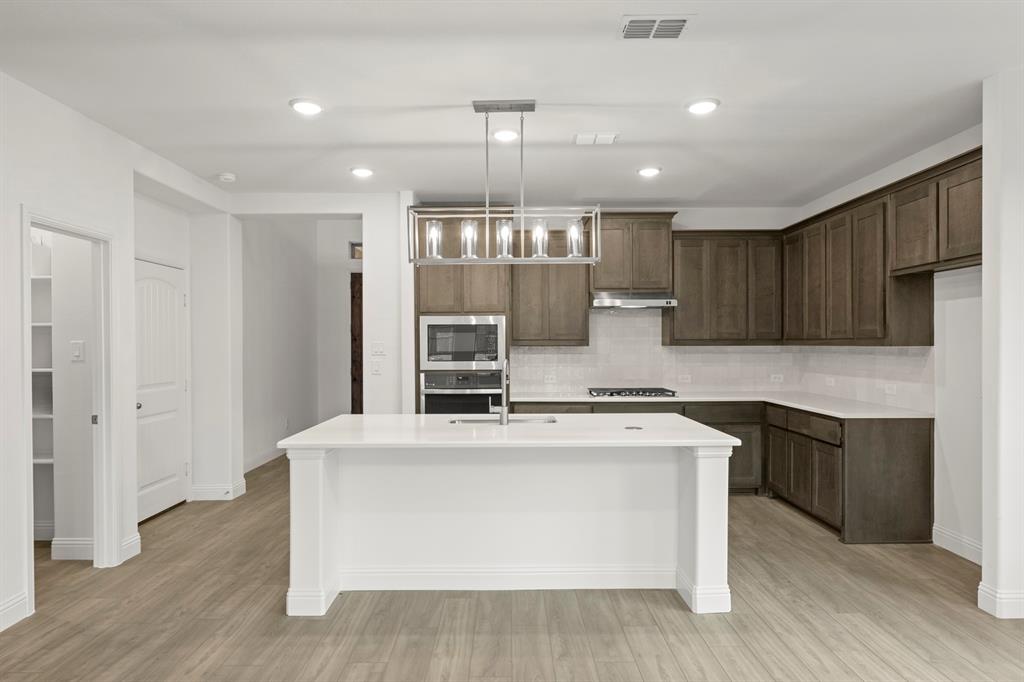 1443 Canadian Lane Van Alstyne, TX 75495 - Photo 4 of 27 06. 1443 Canadian - Kitchen